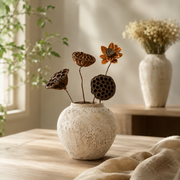 Soft ceramic finish and curved form of the remembrance vase