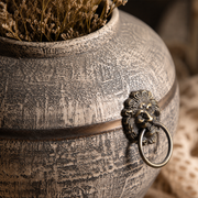 Stone Circle Vase styled in a warm, peaceful home setting